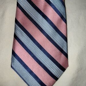 Chaps Men’s York Striped Neck Tie. The primary colors are blue and pink.  NWT.